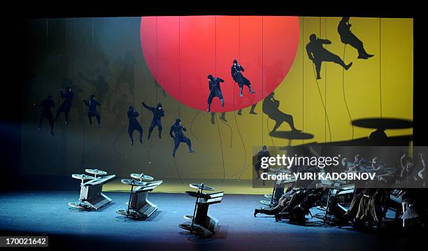 Bellet dancers perform during the dress rehearsal of the "Prince Igor" opera, by Russian composer Alexander Borodin, at the Bolshoi theatre in Moscow...