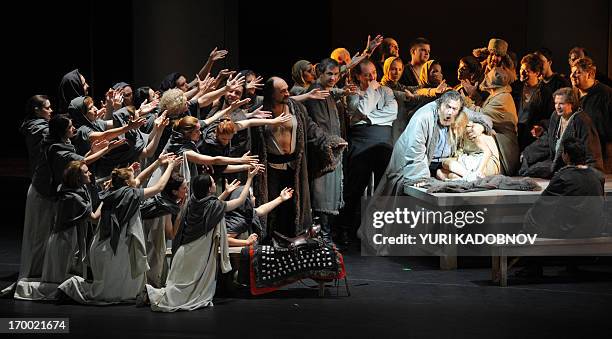 Opera singers perform during the dress rehearsal of the "Prince Igor" opera, by Russian composer Alexander Borodin, at the Bolshoi theatre in Moscow...