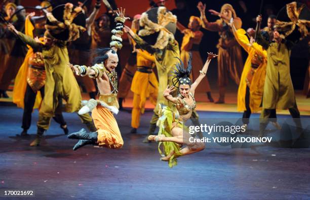 Ballet dancers perform Polovtsian dances during the dress rehearsal of the "Prince Igor" opera, by Russian composer Alexander Borodin, at the Bolshoi...