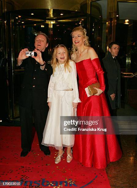 Pierre Franckh with wife Michaela Merten and daughter Julia at the German Film Ball On arrival at the hotel Bayerischer Hof in Munich.