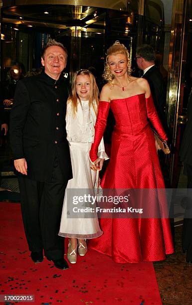 Pierre Franckh with wife Michaela Merten and daughter Julia at the German Film Ball On arrival at the hotel Bayerischer Hof in Munich.