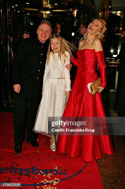 Pierre Franckh with wife Michaela Merten and daughter Julia at the German Film Ball On arrival at the hotel Bayerischer Hof in Munich.