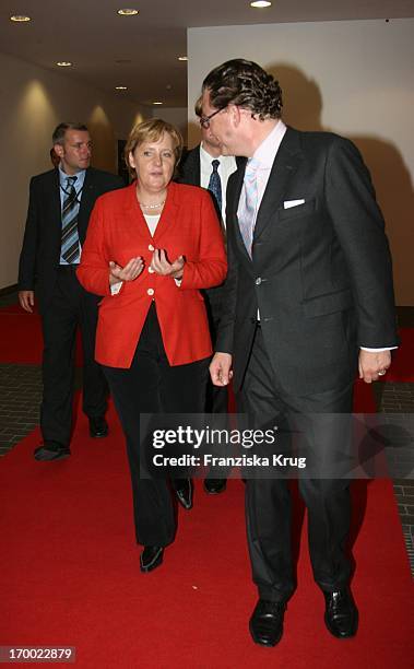 German Chancellor Angela Merkel and Kai Diekmann The picture summer festival in the Axel Springer publishing house in Berlin.