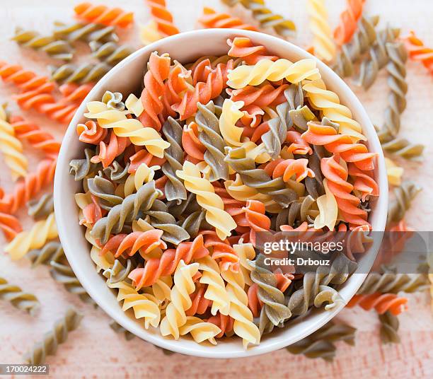 tricolor fusilli - dry pasta stock pictures, royalty-free photos & images