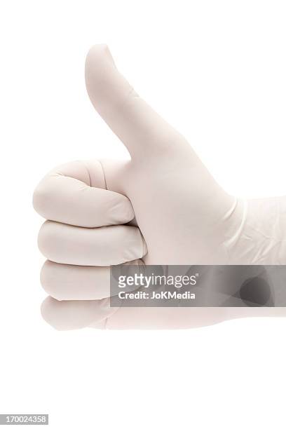 doctor giving thumbs up - rubber gloves stockfoto's en -beelden