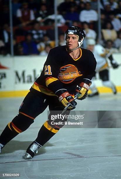 Doug Smith of the Vancouver Canucks skates on the ice during an NHL game against the Pittsburgh Penguins circa 1989 at the Pittsburgh Civic Arena in...