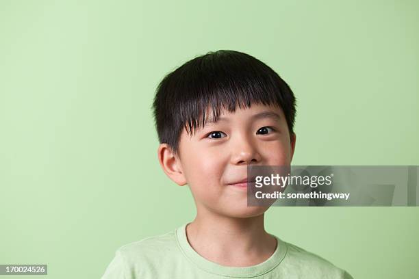 なアジアの少年笑顔 - boy funny face ストックフォトと画像