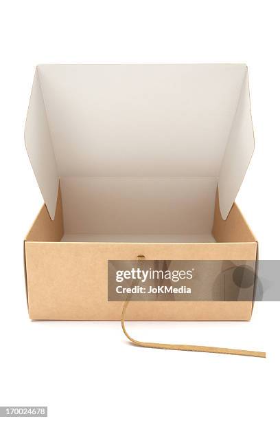 opening a cardboard gift box - small package stock pictures, royalty-free photos & images