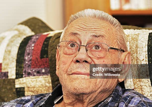 senior man looking up - raised eyebrows stock pictures, royalty-free photos & images