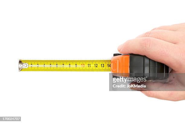 man taking a measurement - centimeter stockfoto's en -beelden