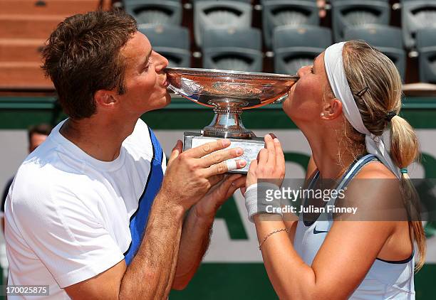 Frantisek Cermak and Lucie Hradecka of Czech Republic pose with the trophy after victory in their mixed doubles final against Kristina Mladenovic of...
