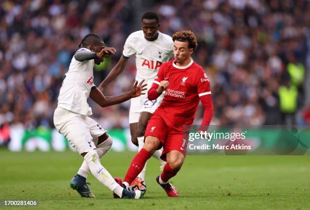 Curtis Jones of Liverpool fouls Yves Bissouma of Tottenham Hotspur resulting in an initial yellow card, later upgraded to red after a VAR review...