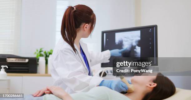 neck or thyroid ultrasound examination - throat exam stock pictures, royalty-free photos & images