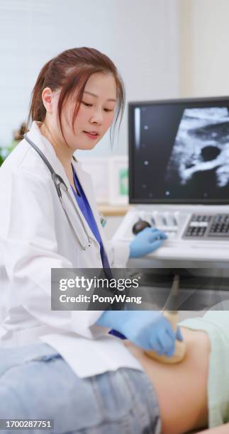 woman belly ultrasound examination - ovarian cyst stock pictures, royalty-free photos & images