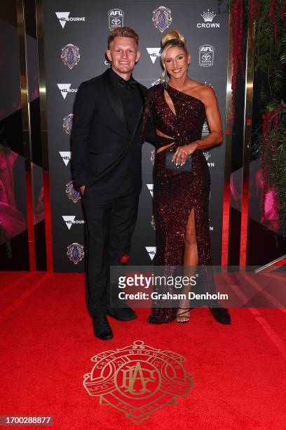 Adam Treloar and Kim Ravaillion arrive ahead of the 2023 Brownlow Medal at Crown Palladium on September 25, 2023 in Melbourne, Australia.