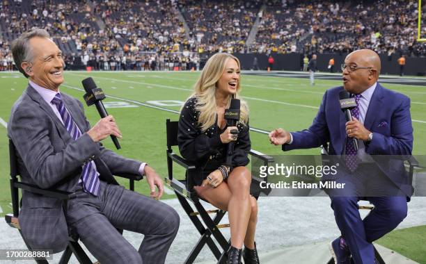 Sunday Night Football color commentator Cris Collinsworth, recording artist Carrie Underwood and NBC Sunday Night Football play-by-play announcer...
