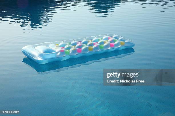 lilo - pool raft stock pictures, royalty-free photos & images