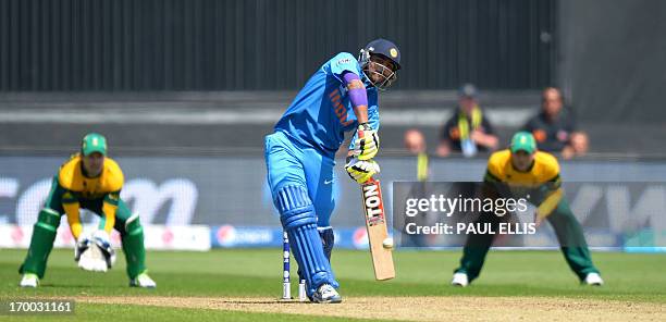 India's Ravindra Jadeja plays a shot during the 2013 ICC Champions Trophy cricket match between India and South Africa at The Cardiff Wales Stadium...