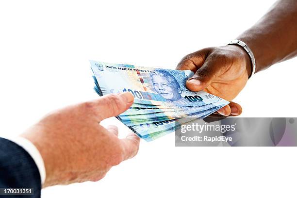 south african currency featuring nelson mandela being passed to man - south africa money stock pictures, royalty-free photos & images