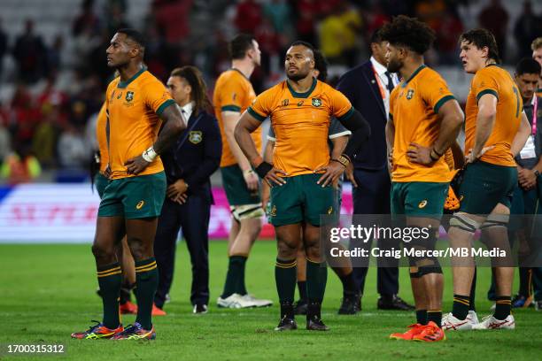 Dejection for Samu Kerevi of Australia and team mates after the Rugby World Cup France 2023 match between Wales and Australia at Parc Olympique on...