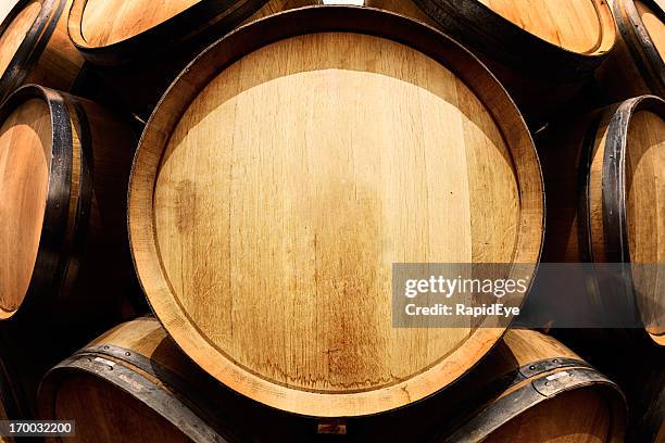 end-on view of oak wine barrel with copy space - wijnvat stockfoto's en -beelden