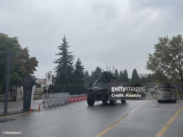Armored vehicles deployed to the scene as security measures are increased after 2 terrorists carried out attack with 1 of them blowing himself up...