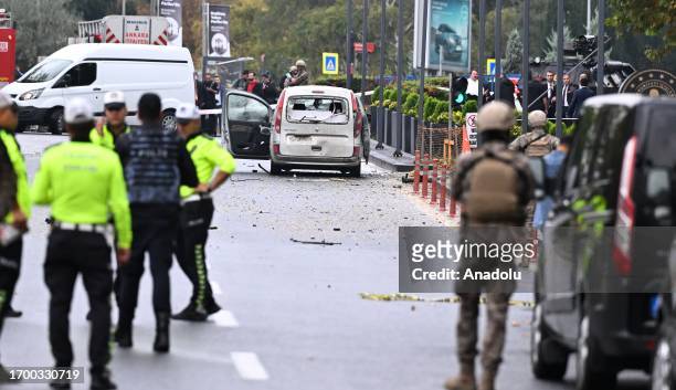 Security forces take measures in the area after 2 terrorists attacked near the Turkish Interior Ministry in Turkish capital of Ankara, with 1 of them...