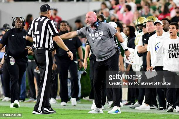 Head coach Trent Dilfer makes a point with an ifficial during a game between UAB and University of Georgia at Sanford Stadium on September 23, 2023...