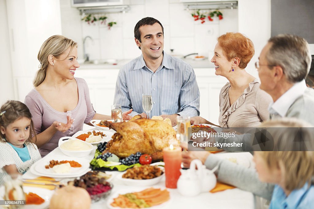 Extended family celebrating Thanksgiving day.