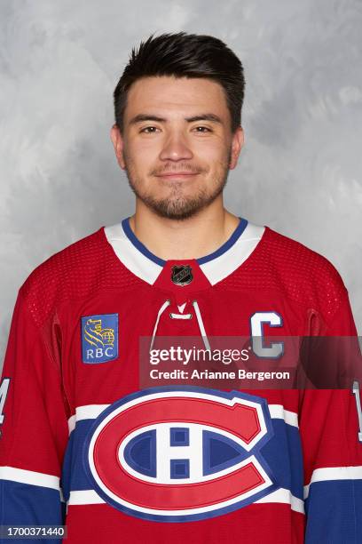 Nick Suzuki of the Montreal Canadiens poses for his official headshot for the 2023-24 season at Sports Complex CN on September 19, 2023 in Brossard,...