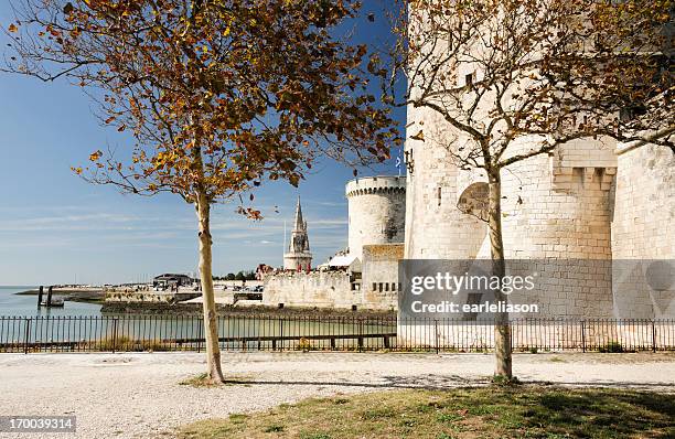 guarded by the towers - la rochelle stock pictures, royalty-free photos & images