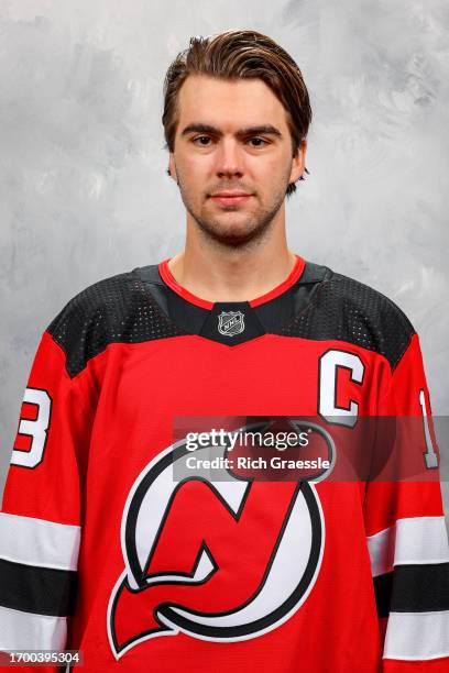 Nico Hischier of the New Jersey Devils poses for his official headshot for the 2023-2024 season on September 20, 2023 at Prudential Center in Newark,...