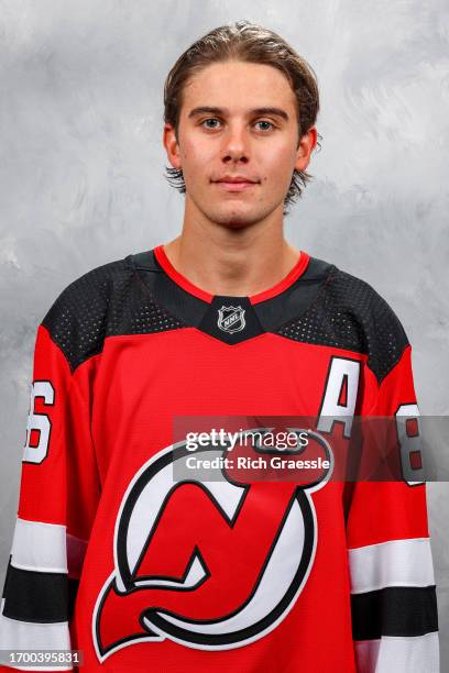 Jack Hughes of the New Jersey Devils poses for his official headshot for the 2023-2024 season on September 20, 2023 at Prudential Center in Newark,...