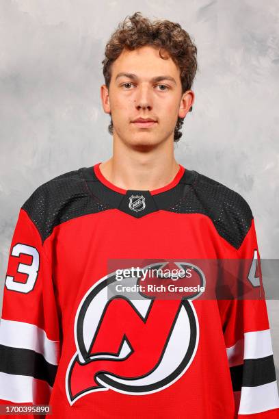 Luke Hughes of the New Jersey Devils poses for his official headshot for the 2023-2024 season on September 13, 2023 at Prudential Center in Newark,...