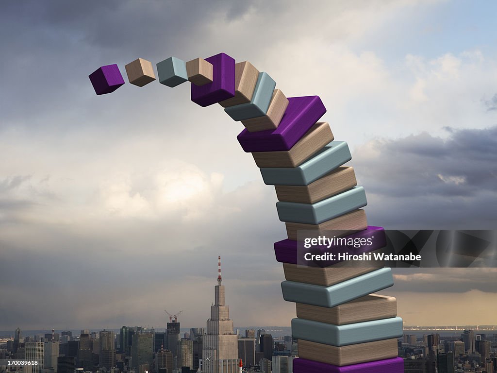 Collapsed building made ??of wooden blocks