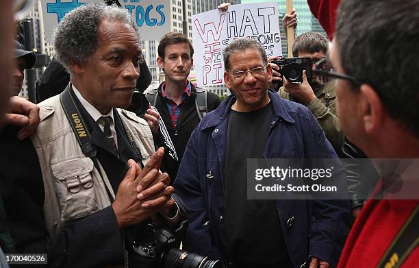 Former Chicago Sun-Times photographers including John White , and Brian Jackson participate in a demonstration outside the offices of the Sun-Times...