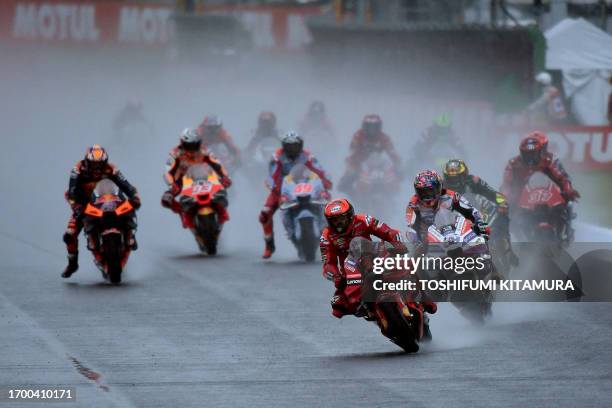 Ducati Lenovo Team rider Francesco Bagnaia of Italy leads the pack in re-start after red flag during the MotoGP Japanese Grand Prix at the Mobility...
