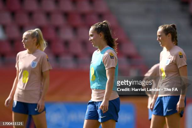 Chloe Kelly, Maya Le Tissier and Lucy Parker of England react during a training session at Stadium Galgenwaard on September 25, 2023 in Utrecht,...