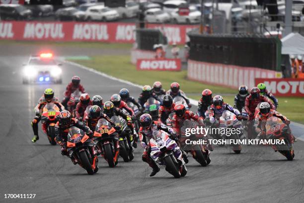 Prima Pramac Racing rider Jorge Martin of Spain leads the pack to start the MotoGP Japanese Grand Prix at the Mobility Resort Motegi in Motegi,...