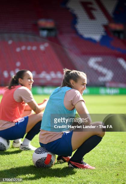 Lucy Staniforth and Georgia Stanway of England look on during a training session at Stadium Galgenwaard on September 25, 2023 in Utrecht, Netherlands.