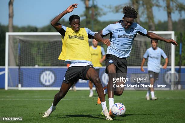 Amadou Sarr of FC Internazionale in action during the FC Internazionale training session at Suning Training Centre at Appiano Gentile on September...