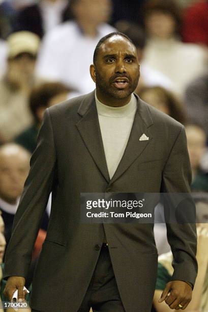 Coach Dru Joyce of St. Vincent-St. Mary High School yells from the bench during the game against Oak Hill Academy at the Cleveland State University...