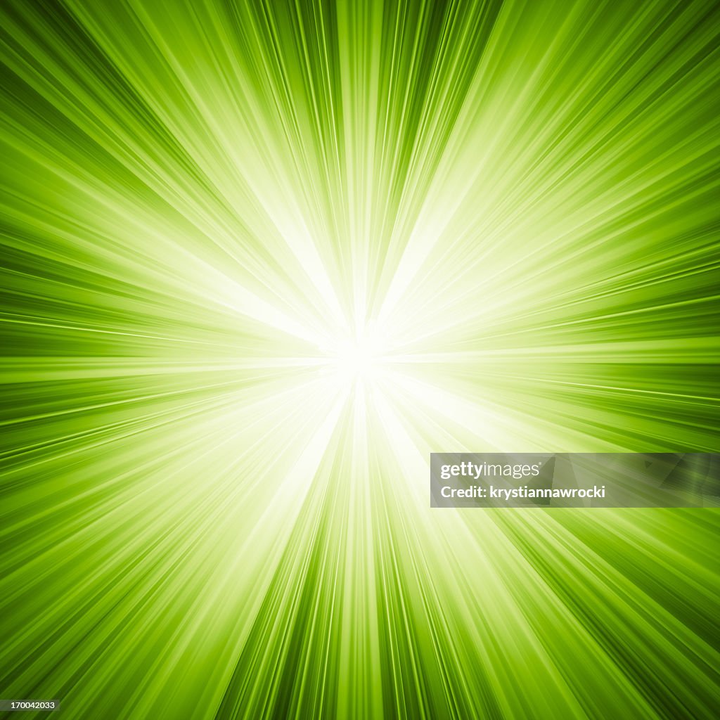 A green background with white light
