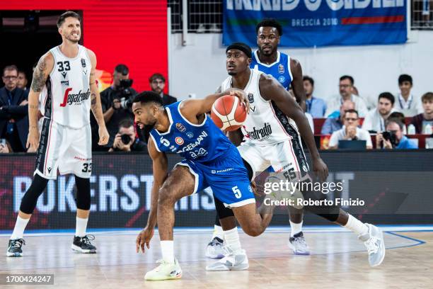 Massinburg of Germani Brescia and Abass Awudu Abass of Virtus Segafredo Bologna in action during the LBA FrecciaRossa Supercup 2023 Final match...