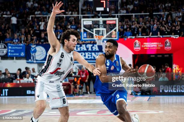 Alessandro Pajola of Virtus Segafredo Bologna and C.J. Massinburg of Germani Brescia in action during the LBA FrecciaRossa Supercup 2023 Final match...