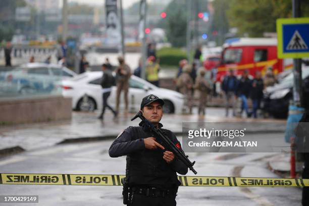 Members of Turkish Police Special Forces secure the area near the Interior Ministry following a bomb attack in Ankara, on October 1 leaving two...