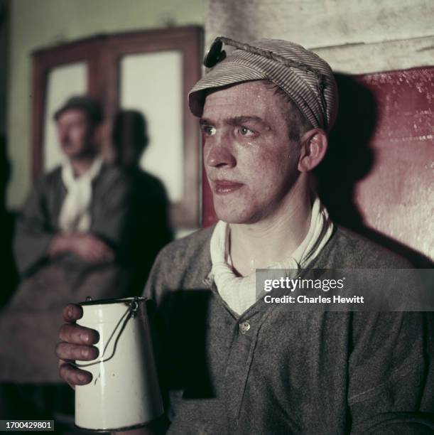 Steelworker taking a break at the Richard Thomas & Baldwins Steelworks, Wales, 1956. Original Publication : Picture Post - 8645 - Steelworks - unpub.