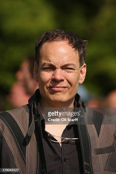 Broadcaster Max Keiser addresses media and protesters in the protester encampment outside The Grove hotel, which is hosting the annual Bilderberg...