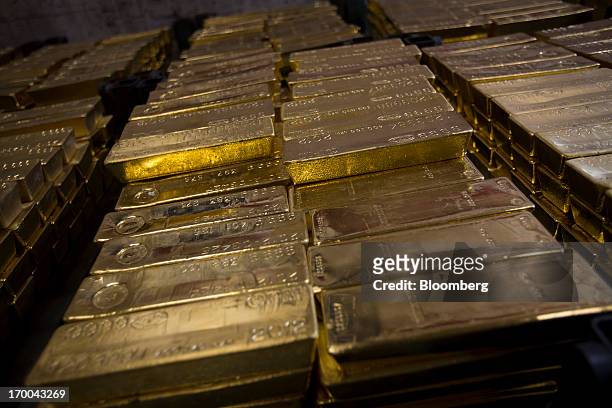 Gold bars, worth hundreds of thousands of dollars each, sit in a vault at the United States Mint at West Point in West Point, New York, U.S., on...