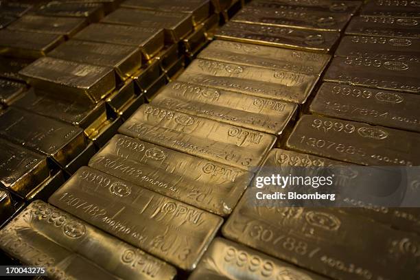 Gold bars, worth hundreds of thousands of dollars each, sit in a vault at the United States Mint at West Point in West Point, New York, U.S., on...